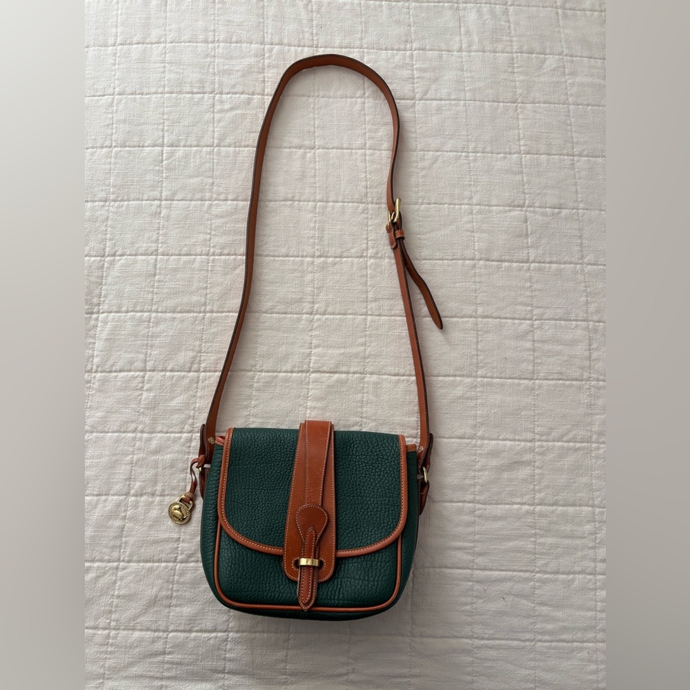 Dooney & Bourke Green and Brown Leather AWL crossbody saddle bag.